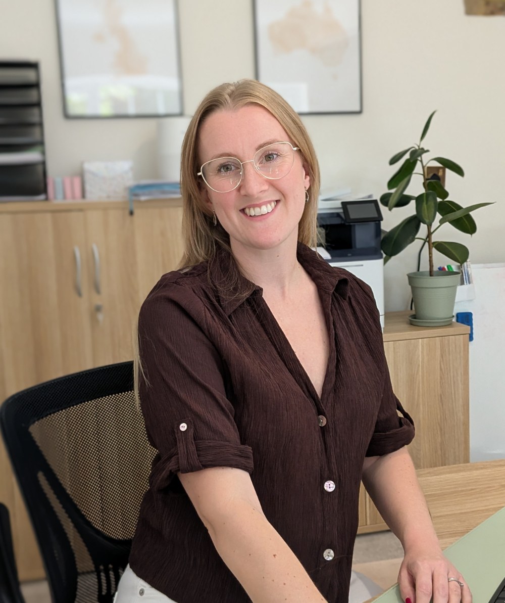 Rebecca Rostron at her desk in Camberley